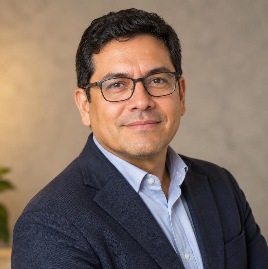 Portrait of a Latin American man in his forties with glasses